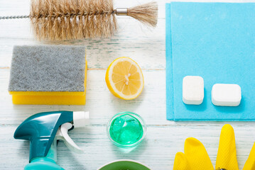 dishwashing products on white wood table