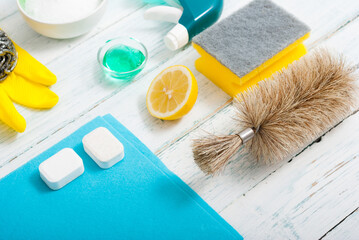 dishwashing products on white wood table