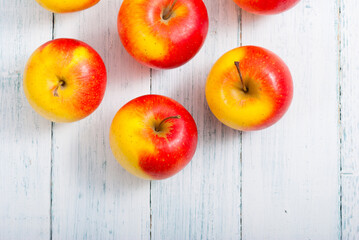 apple fruits on old white wooden table
