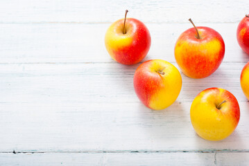 apple fruits on old white wooden table