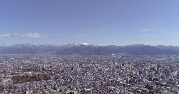 空撮 - 長野県長野市中心部の街並 ビル街 ドリー左から右 観光素材 ビジネス素材