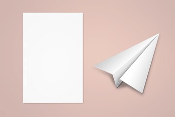 A white paper plane and blank paper on background.
