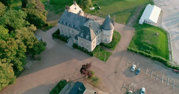Aerial zoom out view of a luxurious french castle