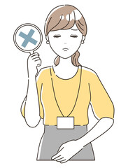 ばつ印を出すカジュアルな女性オフィススタッフ（上半身）