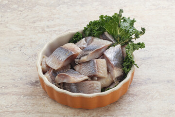 Herring fillet slice on the bowl