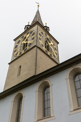 spire of St. Peter church in Zurich with large clock face