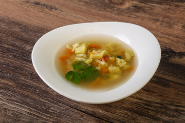 Tasty chicken soup with carrot