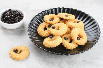 Vanilla Chips Cookies, served on black plate, copy space. Popular to celebrate Eid al Fitr. Selective focus image.
