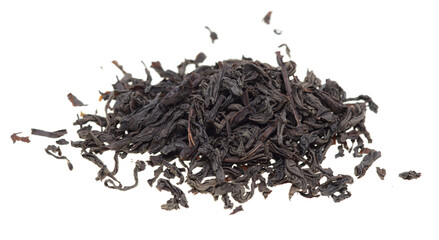 Dried black tea leaves on a white background.