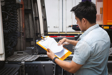 Auto Mechanic is Checking the Semi Truck's Engine Maintenance Checklist. Lorry Tractor. Inspection Truck Safety Driving. Shipping Cargo Freight Truck Transport. Auto Repair Service Shop. 		