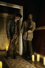 Obraz na płótnie Canvas Zombie house with candlelight and scary corpse