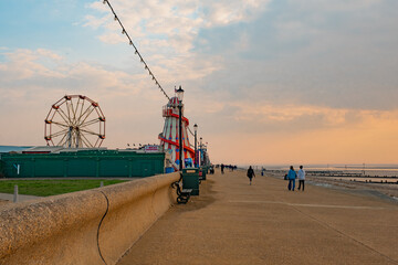 A view down the promenade or esplanade at sunset in the seaside town of Hunstanton on the North...