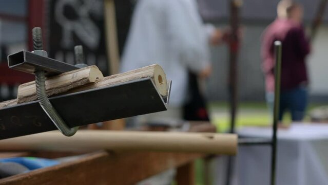 The craftsmanship of Slovak traditional music instrument Fujara in traditional village Čičmany in Slovakia , slow-motion wood carving