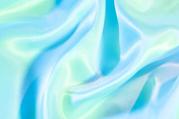 Light blue abstract bright texture.  iridescent surface wrinkled background