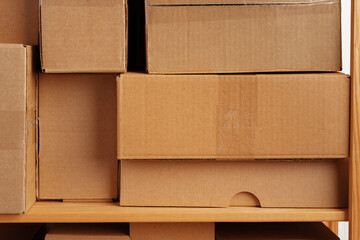 Cardboard boxes stacked in a pile for background