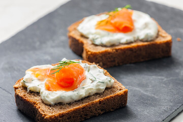 whole grain bread with dill spread and smoked salmon