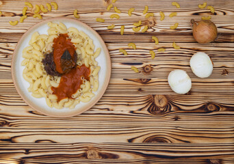 beef meat with tomato sauce and pasta