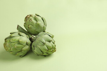 Fototapeta premium Concept of healthy food with artichoke, space for text