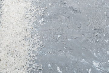 Background from white sea salt. Coarse rock salt texture witth copy space