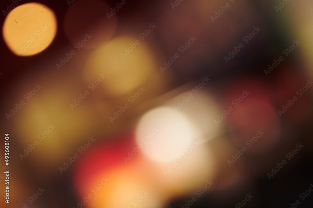 Wall mural defocused image of illuminated lights at night