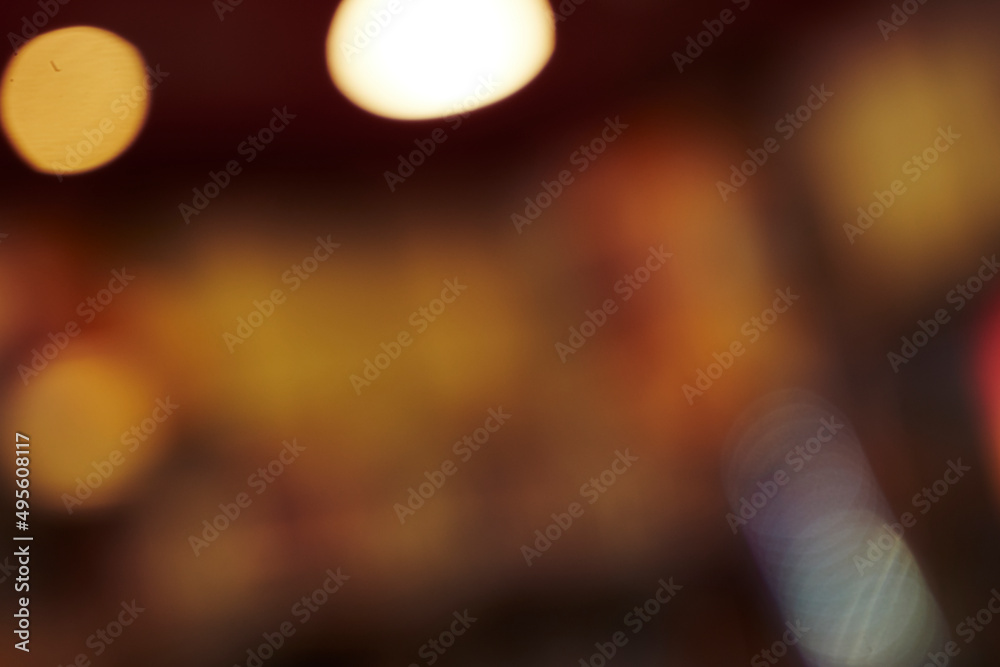 Wall mural Defocused Image Of Illuminated Lights At Night