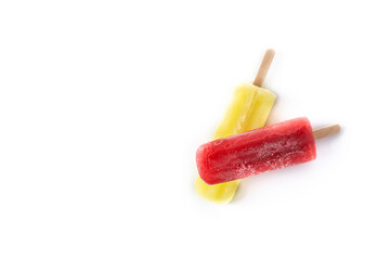 Strawberry and lemon popsicles isolated on white background. Top view. Copy space