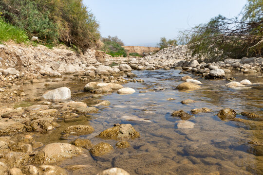 The Prat  River flows into the Jordan River near the Baptismal Site of Jesus Christ - Qasr el Yahud near to Jericho in Israel
