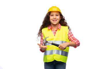 building, construction and profession concept - smiling little girl in protective helmet and safety vest with hammer over white background