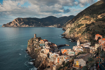 view of the town of vernazza by the sea in italy