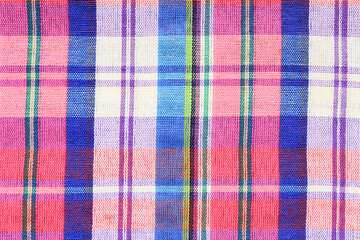 Colorful thai loincloth pattern as background. bright plaid fabric of thailand. 