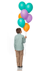 birthday, childhood and party concept - little boy with balloons over white background