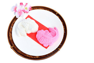 Snazzy snack "khanom goh" on white background. Kind of chinese pancake made of rice flour, a traditional fish shaped snack for chinese festival in autumn. clipping path. 