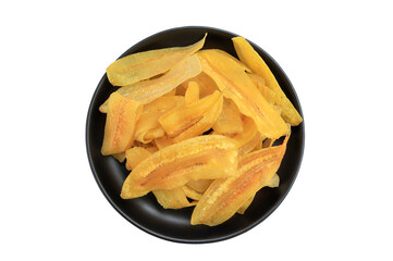 crispy banana slice chips, fried or baked slice banana on black plate with clipping path.