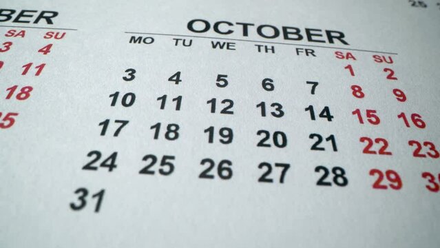 October 2022 Calendar. Hallowen day.Save the date. Macro detailed calendar with holidays, weekend and working days. Columbus day. Boss day. Macro slose up shot
