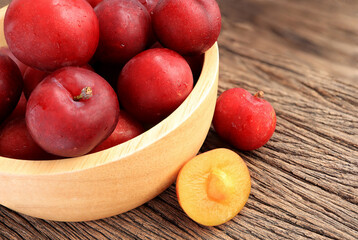 Ripe plums, fresh red plums on dark tone. background of beautiful home plums