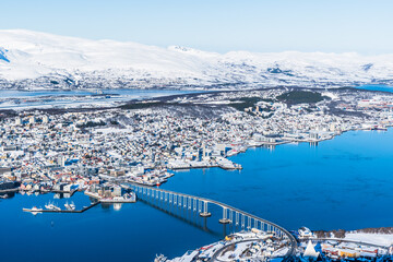 Incredible View to Tromso city in Norway from Storsteinen peak, a mountain ledge about 420 m (1378...