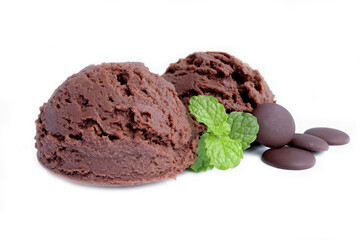 Homemade chocolate sorbet. Chocolate ice cream with fresh mint leafs on a white background.