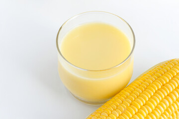Sweet corn juice ,fresh corn milk and corn on the table. Healthy drink