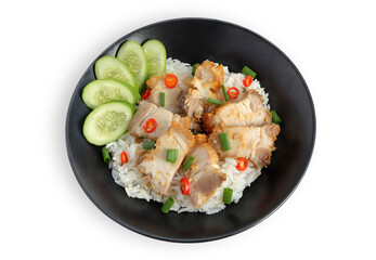 Close up of pork belly stirred fry with rice. homemade crispy belly pork and chilli topped rice. Thai local food style, top view.