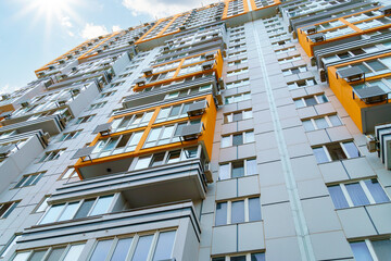 facade of a modern multi-storey residential complex, apartment building exterior
