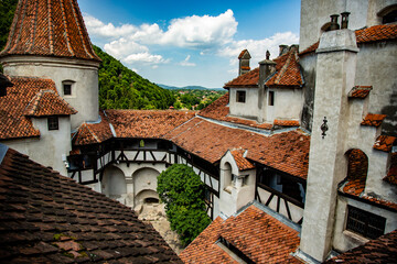 High angle shot of the interior part of Bran Castle near Brasov, Romania surrounded by forest