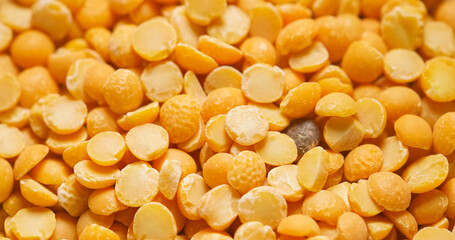 Closeup photo of natural dried yellow peas rotating
