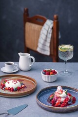 Breakfast dessert with coffee and strawberries