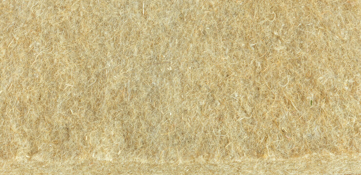 materials background - compressed thermal insulating hemp fiber bonded panels.