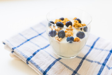 yogurt with cereal and blueberries