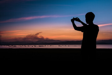 Silhouette of a man at sunset