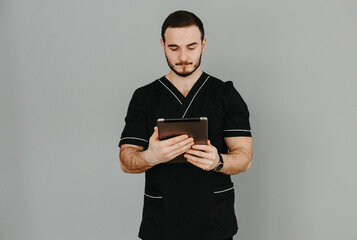 smiling doctor with laptop