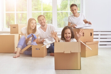 Fototapeta na wymiar portrait of happy family mooving in new home