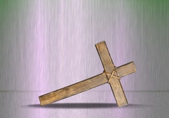 Holy and Good concepts. Wooden cross on vintage background.