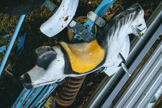 Old playground equipment stands out in pile